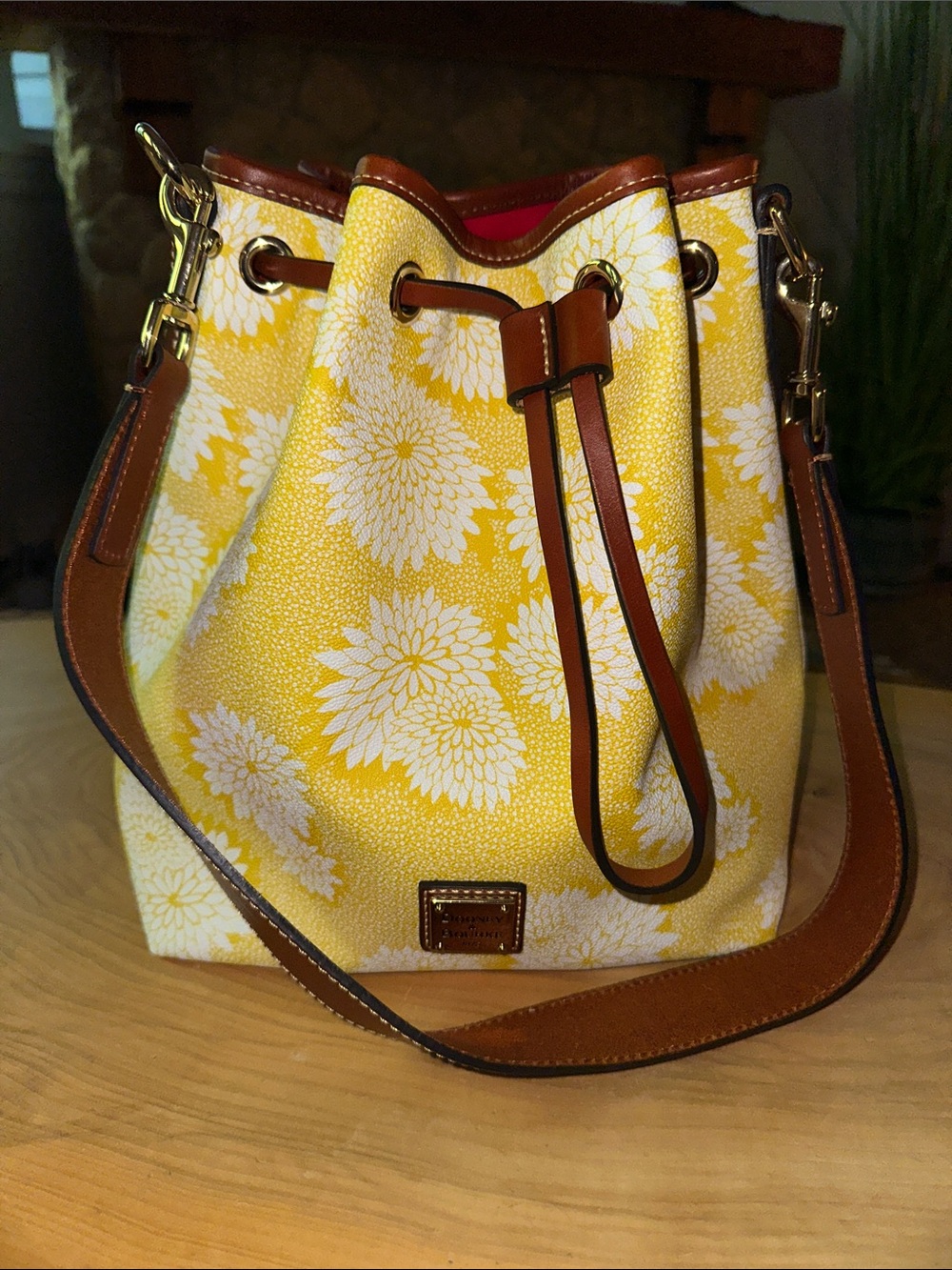 Dooney & Bourke Yellow Floral Drawstring Bucket Bag with Brown Trim